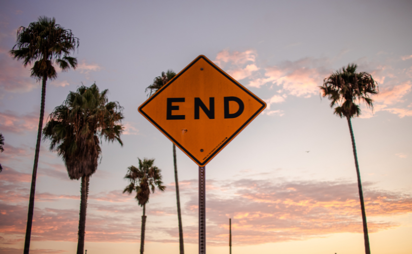 Banner image showing street sign warning that says 'end'